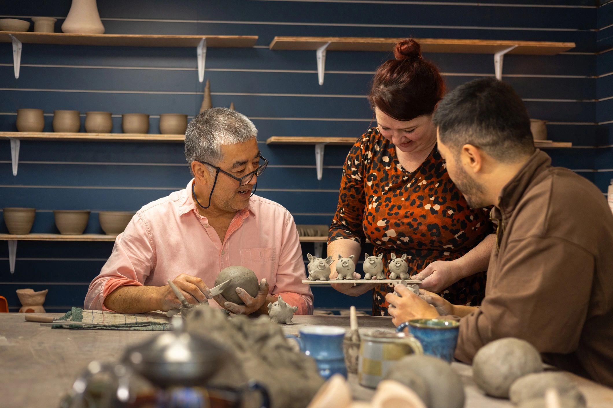 Creative team collaborating in a hands-on workshop setting
